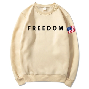 Unisex beige hoodie with black Freedom print and American flag sleeve patch detail