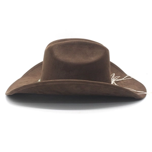 Close-up of brown suede cowboy hat featuring curved brim and white stitching details
