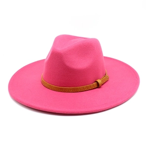 Detailed view of pink wool fedora hat featuring a brown crocodile textured leather belt strap