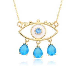 Detail of gold evil eye necklace with blue zircon stones and white enamel drops