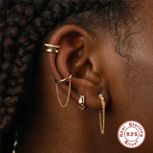 S925 sterling silver star hoop earrings with tassel chains worn on model's ear