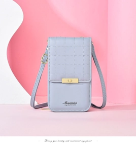 Detailed view of lavender faux leather crossbody bag with elegant diamond quilting