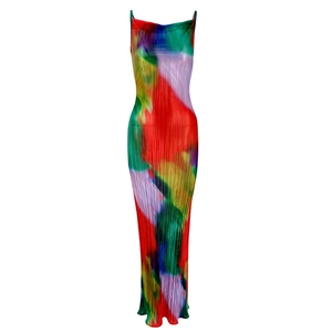 Close-up of pleated fabric texture on a slim-fit artistic floral maxi dress
