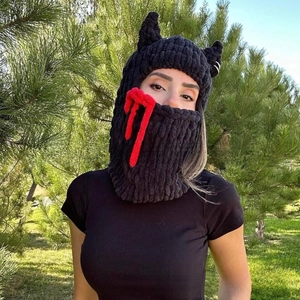 Knitted Halloween balaclava with red devil horns and crochet blood drip detail
