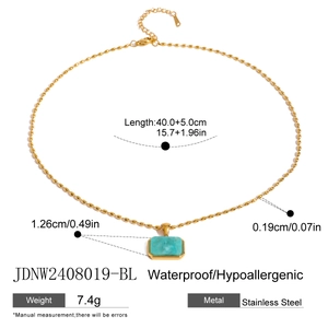 Detail view of turquoise stone pendant necklace with technical product specifications