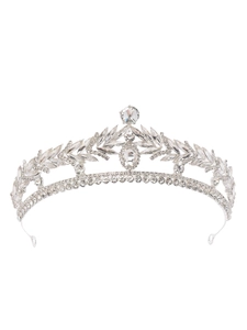 Macro detail of silver bridal tiara featuring leaf-shaped crystals and rhinestone setting