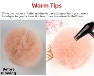 Restore pink fluffy plush balls to a soft state using a hair dryer for accessories