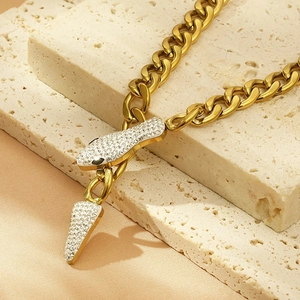 Exaggerated 18K gold plated snake chain necklace with rhinestone encrusted snake head