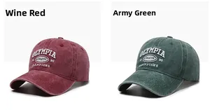 Close-up of burgundy and army green vintage washed cotton baseball caps with embroidery