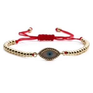 Adjustable red evil eye bracelet with gold beads and sparkling micro-pave crystals