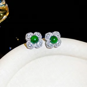 Elegant emerald flower stud earrings in S925 sterling silver with sparkling diamonds