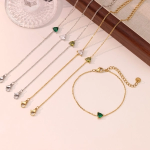 Elegant gold and silver link bracelets with geometric triangle gemstone pendants
