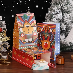 Christmas kraft paper gift bags with gingerbread man and reindeer festive illustrations