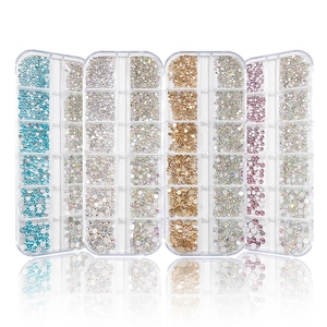 Flatback glass nail art rhinestones kit with various colors in a 12-grid organizer box