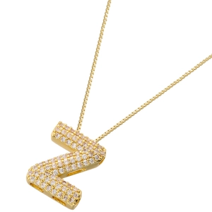 Macro detail of gold-plated Z letter pendant with micro-pave cubic zirconia on box chain