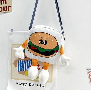 Detailed view of white canvas crossbody bag featuring a 3D cartoon hamburger character