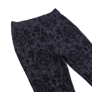 Detailed view of Gothic black mesh fabric with floral, portrait and cross patterns