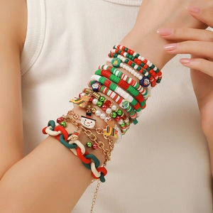 Christmas multilayer bracelet set with pearls, Santa and snowman charms on wrist