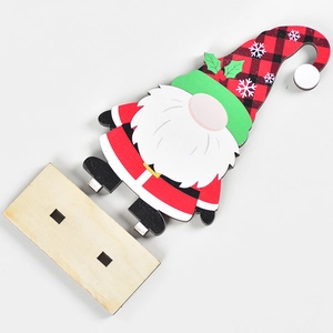 Christmas wooden gnome tabletop ornament with red plaid hat and rustic timber base