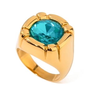 Polished gold stainless steel men's ring with a large round blue zircon stone inlay