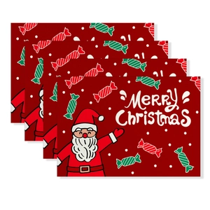 Detailed set of 4 red Christmas placemats with Santa Claus and Merry Christmas print