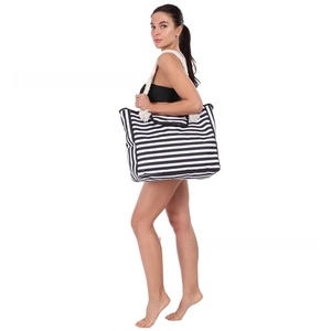 Close-up of a striped canvas beach tote bag featuring durable white cotton rope handles