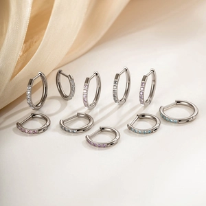 Titanium hoop earrings set with minimalist white pink and blue cubic zirconia accents