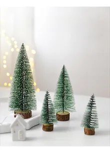 Set of four mini frosted Christmas trees with snow needles and natural wooden bases