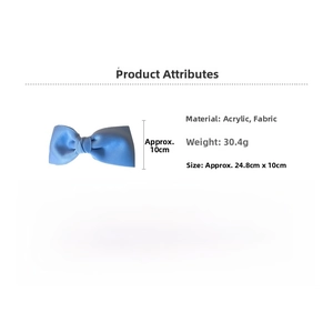 Detail view of large blue fabric bow hair clip showing dimensions 24.8cm by 10cm