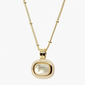 Detail of 18k gold plated necklace featuring square white mother of pearl pendant