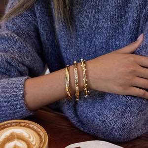 Three-piece stackable 18k gold-plated stainless steel bangles with crystals and pearls