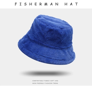 Detailed view of soft blue faux fur fisherman hat with comfortable plush texture