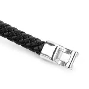 Detail of black braided leather bracelet with polished silver metal clasp on white background