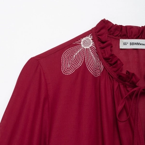 Vintage raspberry blouse for women with white floral embroidery and ruffled tie collar