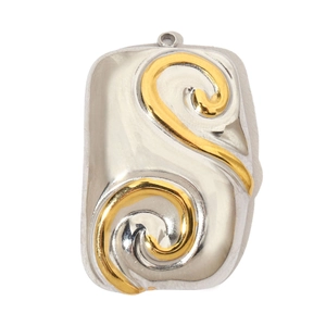 Detail view of two-tone stainless steel pendant with gold spiral texture and silver base