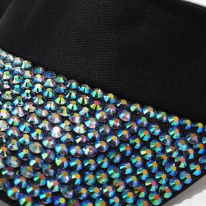 Women's sun visor hat featuring shimmering colorful rhinestones on black fabric detail