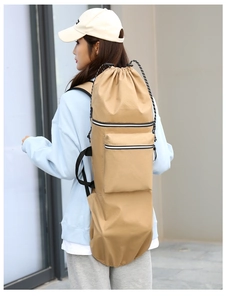 Outdoor waterproof khaki skateboard bag showing large capacity design and side handle