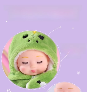 Close-up of baby doll face showing high-definition painting and green dinosaur plush hood