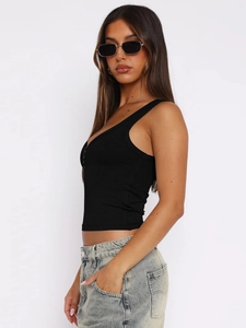 Close-up of the ribbed texture and seamless stitching on this black crop top tank