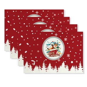 Set of 4 red Christmas placemats with Santa reindeer print and Merry Christmas text