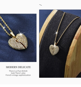 Detail of gold heart pendant with sparkling pavé cubic zirconia on blue velvet