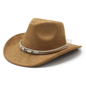 Detail of brown suede cowboy hat with white braided band and evil eye bead accents