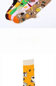 Detail of cotton crew socks featuring colorful jacquard burger and coffee patterns