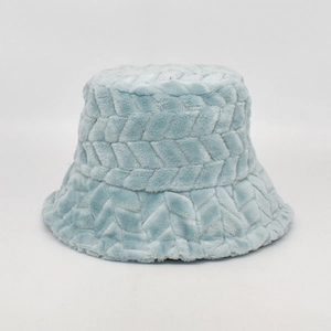 Detail view of light blue plush bucket hat featuring a unique V-shape wave woven texture