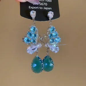 Exquisite S925 silver butterfly earrings with green teardrop crystal pendants for women