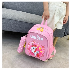 Pink unicorn kids backpack shown in use with a matching pencil case hanging on the side