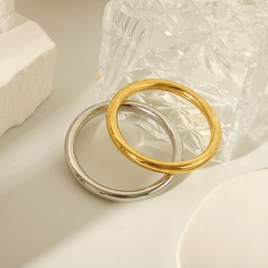 Minimalist 18K polished stainless steel hollow tube bangles in gold and silver finish