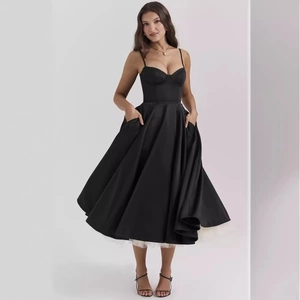 Elegant black satin princess dress with French mesh lining and full skirt for women