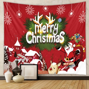 Detail of red Bohemian Christmas tapestry with Santa Claus and Merry Christmas text