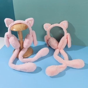 Detailed view of pink plush cat ear earmuffs with glitter accents and long moving straps